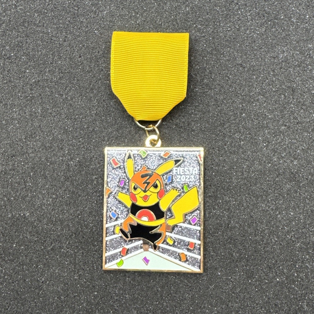2023 Fiestamon Pikachu Libre Fiesta Medal San Antonio TX Pokémon Collectible